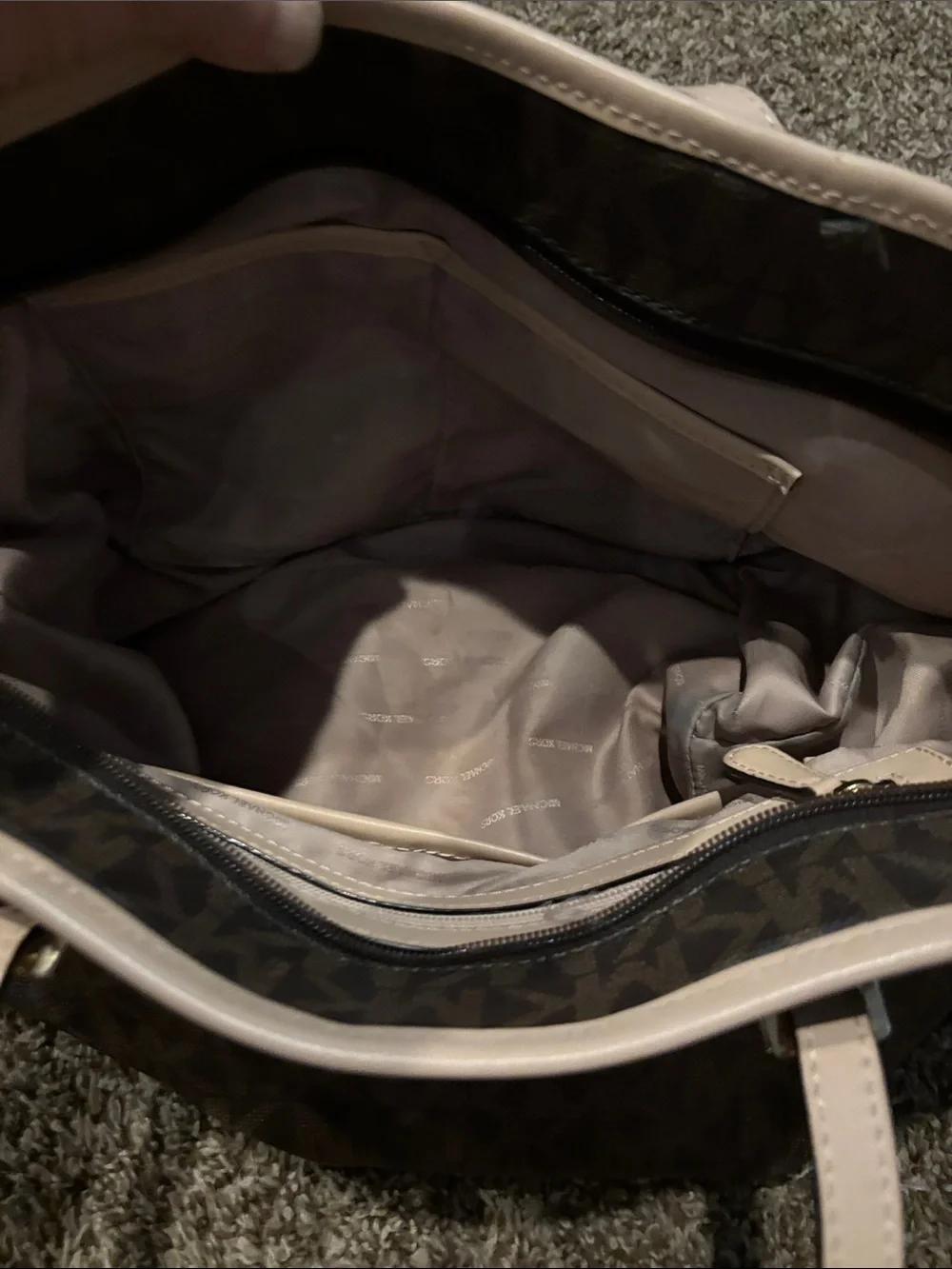 Michael Kors Brown Tote with tan trim does have some spots on inside
